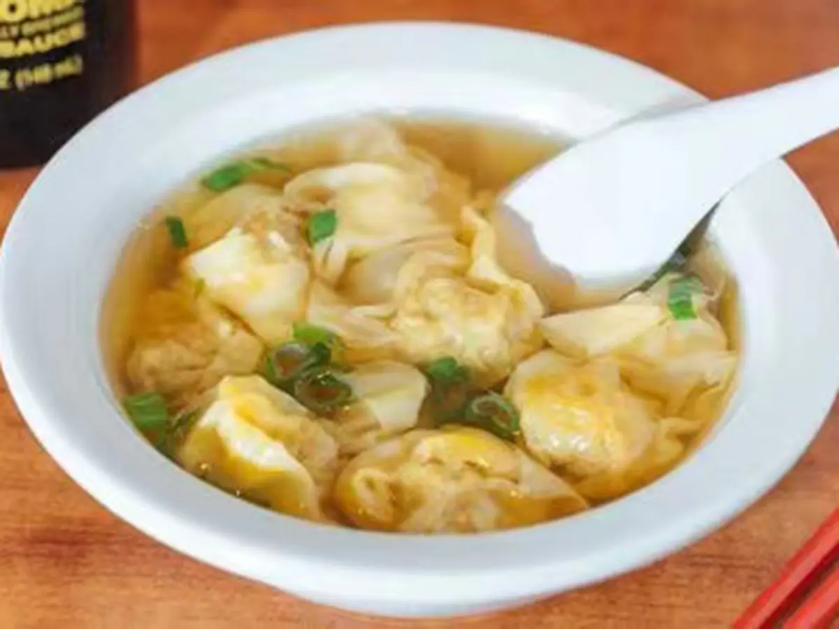 o-Believe-Bakery-Shop-Wonton-Soup-New-York Wonton Soup - Delicate wontons in flavorful broth, garnished with scallions at Go Believe, a Bakery Shop in New York